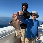 Grouper caught by young angler on Boca Grande Fishing Charter